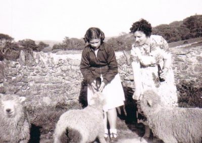 Dawn Kelland nee Gordon and her mother feeding lambs Garlands Farm South Allington