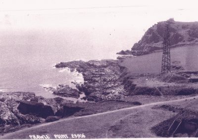 Postcard. The Radar tower down at Prawle Point with the receiver bunker in the foreground on the right with the Lookout above. Showing the land dividing Western Cove and Landing Cove already partly eroded. RAF War (WW)