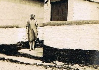 Unknown woman outside Methodist chapel (now Community Hall)