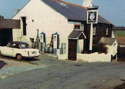 Pigs Nose petrol pumps with a Triumph Herald parked (Sue Ireland's)