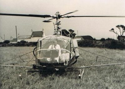 Dorothy May Tripp just landing from helicopter (spraying the land) August 1959