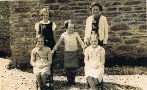 East Prawle School: Alice Stone in the centre, Margaret Login/Mitchelmore top right, Phyllis Partridge/Wotton bottom right